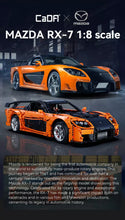 Lade das Bild in den Galerie-Viewer, Cada C61502 - Mazda RX-7 - RC + Motor - 1:8 - Neu - 3305 Teile - OVP
